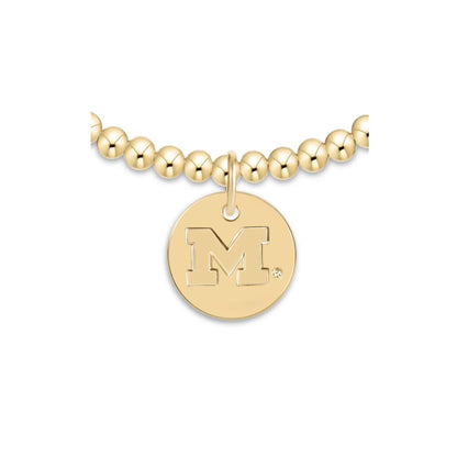 ecollegiate classic gold 3mm bracelet - university of michigan disc